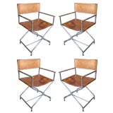 Set of Four Chrome and Leather Campaign style chairs