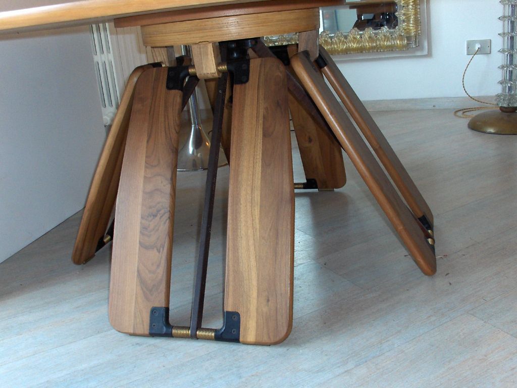 Remarkable adjustable Height table by Franco Poli for Bernini. This table adjusts to dining and coffee table heights. The name Due Acca, (two H's) refers to two heights