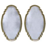Pair of Baroque style Oval Cast Brass Mirrors