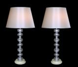 PAIR OF AMERICAN ART DECO POLISHED CAST ALUMINUM LAMPS