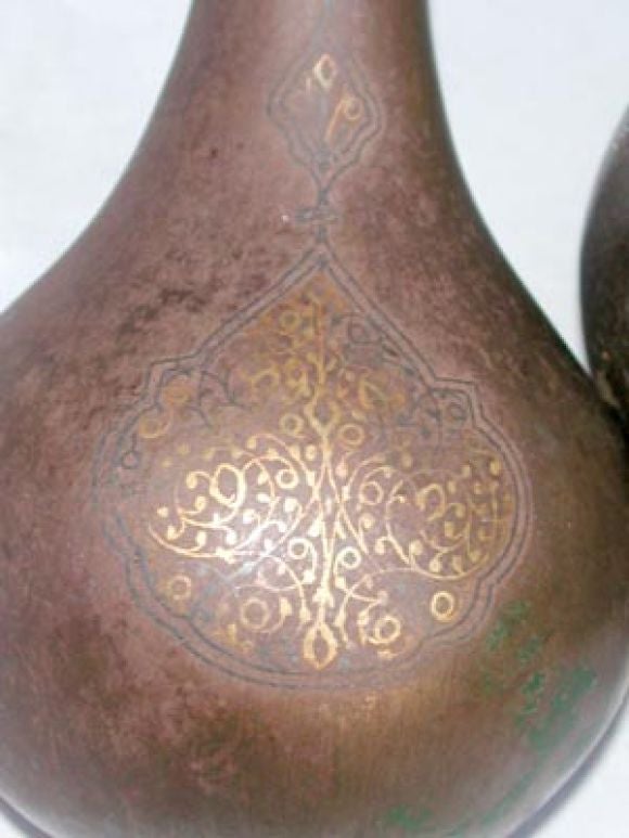 THREE INDIAN METAL MODELS OF A PEAR, A POMEGRANATE AND AN APPLE