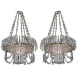 A COMPANION PAIR OF FRENCH ART DECO CLEAR GLASS CHANDELIER