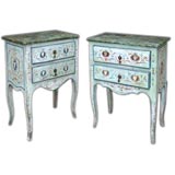 A PAIR OF ITALIAN NEO-CLASSICAL POLYCHROMED TWO DRAWER COMMODE.