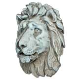 A MIRTHFUL FRENCH NAPOLEON III WELDED ZINC REPOUSSE LION MASK