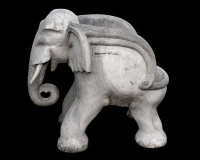 AN ENCHANTING SOUTHEAST ASIAN 1960'S CARVED AND WEATHERED SOLID TEAK ELEPHANT CHAIR.