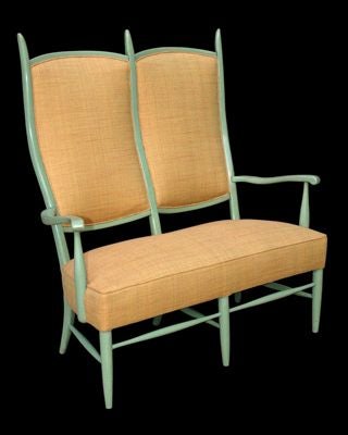 A SPARE AMERICAN 1930'S CELADON-PAINTED WOODEN TWO-SEAT SETTEE WITH LATER UPHOLSTERY. The lithe open-framed settee with three elongated, serpentine rear supports rising from slender, tapered feet, centering two conjoined upholstered seat backs, and
