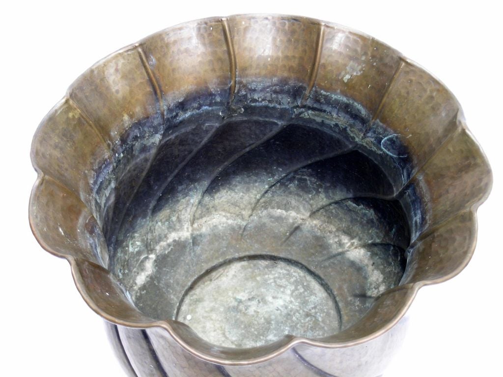 AN ITALIAN ART DECO BRASS REPOUSSE PLANTER by Casagrande 1