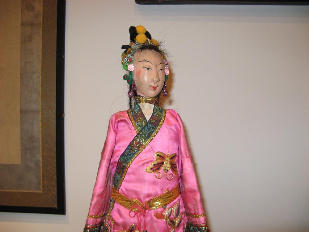 Chinese folk character puppet. Carved and painted wood with silk costumes. Mounted on a metal stand. 204135-16510