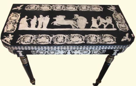 Elegant paint decorated card table penwork folding games table.  Neo-classical motifs picked out of a black background.  The tables legs highlighted with gilt.  Paint appears to be original