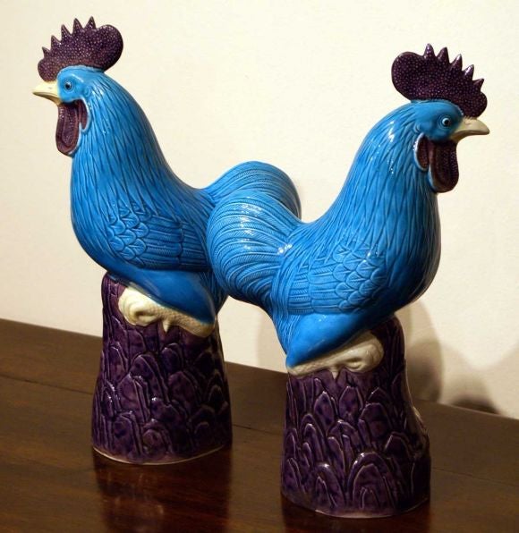 A large pair of Chinese turquoise glazed porcelain roosters with purple combs circa 1920.