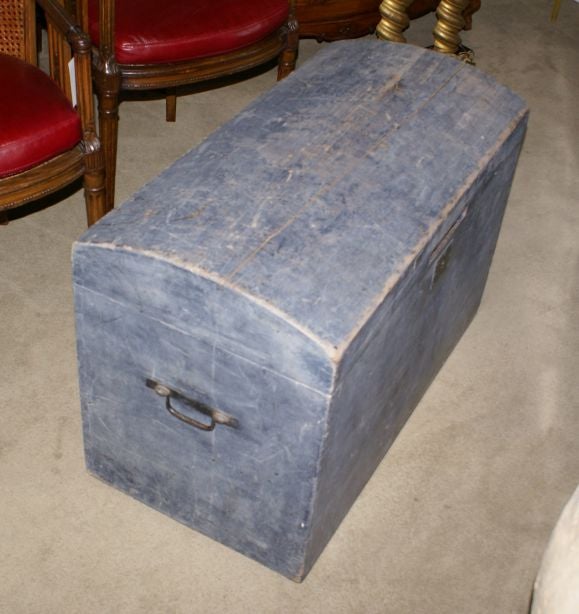 A wonderful powdery blue trunk.  Probably American and early 19th century.  Lock has been removed and a hole was cut to open the trunk.  The top has a split.