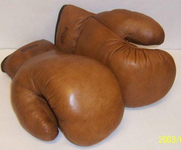 Vintage boxing gloves, used, but in fine condition.  A fun decoration for a den.