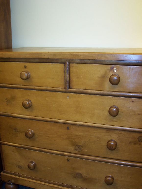 A good Victorian pine chest of drawers, sturdy 2 over 3.  An excellent size for storage.  Original brass escutcheons.