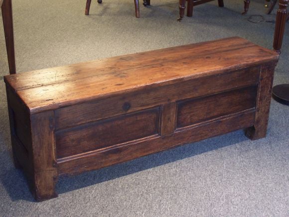 Small rustic bench from France with one drawer on the end. The dark pine is rich in color and wear. Great chunky look. Note the shaped front feet. The back view is seen in image 5. (Note that at one time this piece had hinges for a lift-top, but no