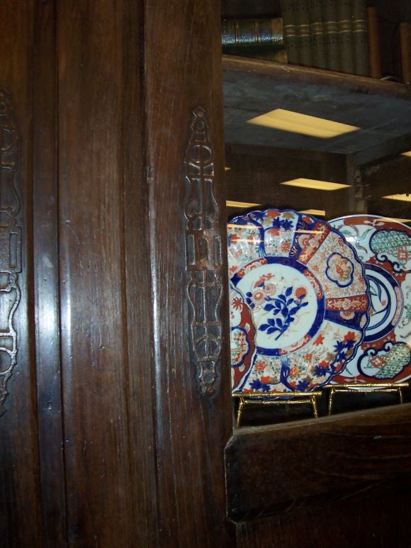 Chestnut glass-fronted cabinet