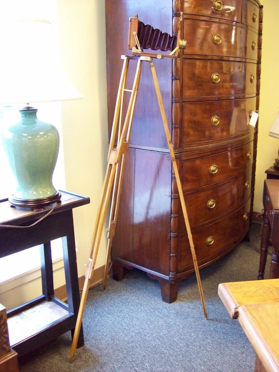 Victorian 1/4 plate camera from England on a wooden tripod. An excellent gift for a photography buff. Camera without tripod measures approximately 10