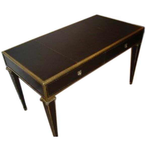 A Brass Trimmed French Leather Desk in the Neo-Classical Style