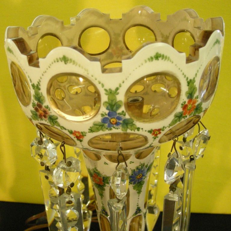 Handpainted floral design enamel on glass with scrolling gilt decoration; each lighted chalice-shaped vase is decorated with ten (10) prism cut and teardrop hanging crystal drops (40w max light bulb recommended).