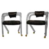 Pair of Lucite Armchairs on Wheels