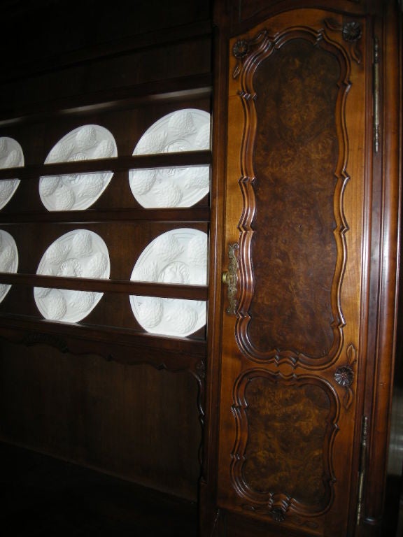 Two-Part china buffet and hutch with bottom section comprised of two (2) cabinet doors below three (3) drawers and top section with three (3) open shelves for plate display flanked by two (2) cabinet doors on each side. The hutch is equipped with