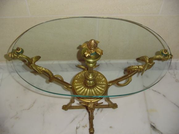 Cast Brass and Oval Glass-Topped Occasional Table