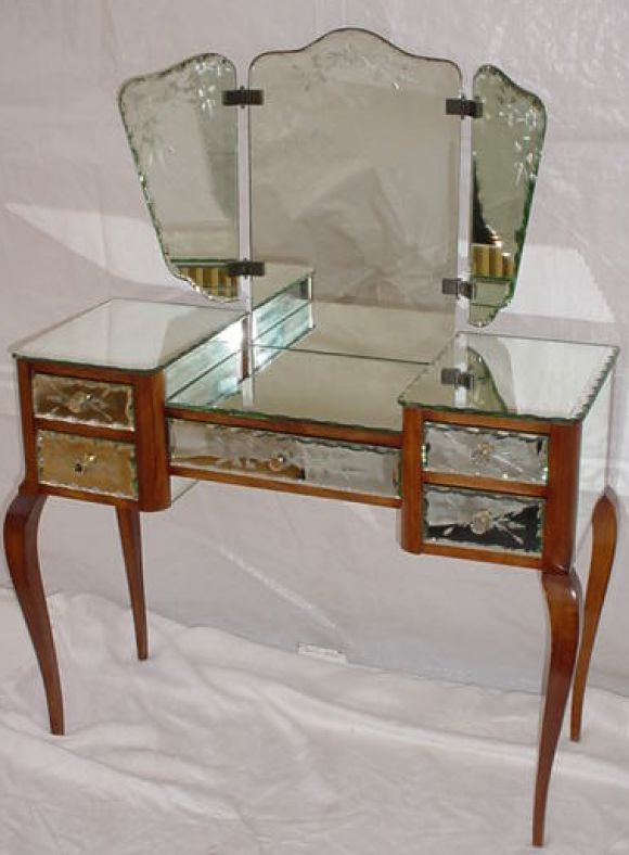 Antique mirrored vanity with removable trifold, hinged mirror; all mirrors have matching etched pattern and drawer pulls are also mirrored.