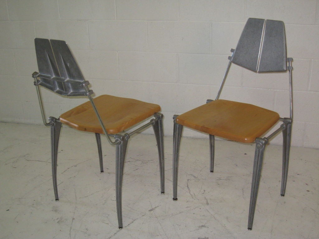 Sand Cast and Polished Aluminum Table and Pair of Chairs with Maple Seat. Two tables available Rpbert Josten and Associates. Literature: GA Houses 39 .Futagawa  ppg  40-49