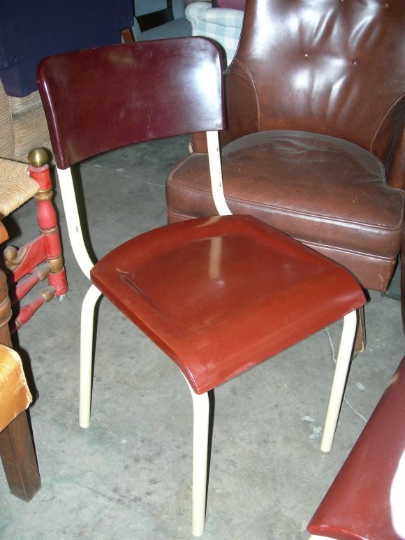 French Bakelite Chairs with Painted Metal legs designed by Rene Herbst