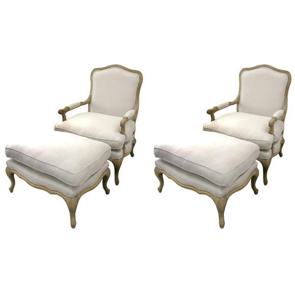PAIR OF FAUTEUIL CHAIRS WITH OTTOMANS