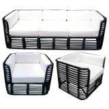 THREE PIECE RATTAN SEATING SUITE ATTRIBUTED TO FICKS REED