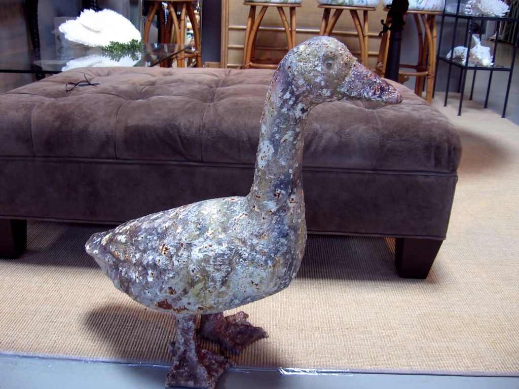 PAIR OF PATINATED CAST IRON GEESE