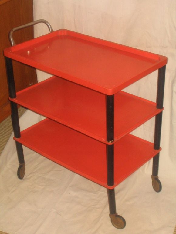 Extremely Rare and Stunning Hand-made Red Lacquered Tea/Drinks Cart. 3 layers of shelves, legs lacquered black, all original, no replacements. Cart and legs completely dis-assemble.Provenance: Architects Studio, Dessau, Germany; probably from