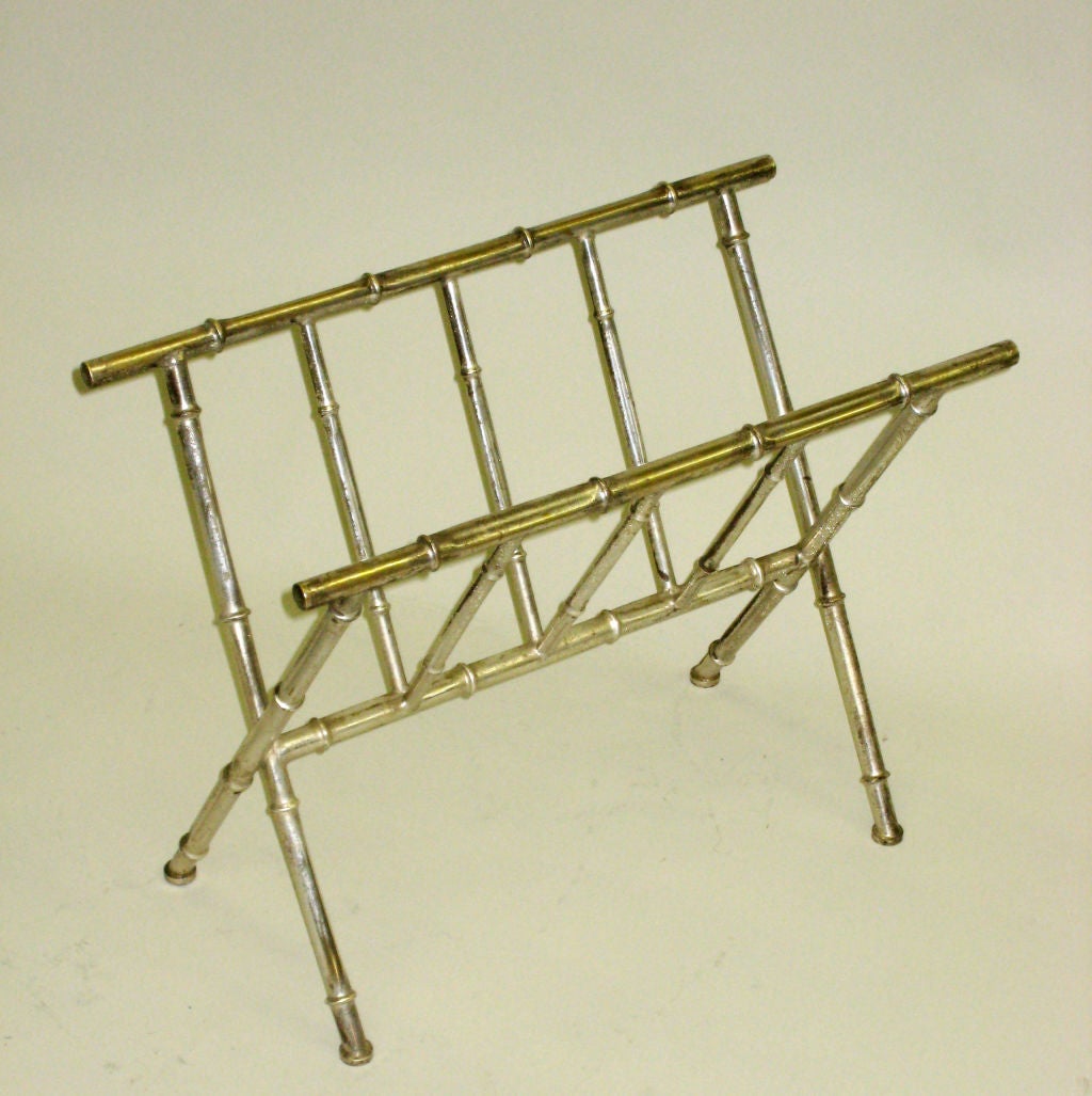 An elegant French Mid-Century nickel brass magazine stand in faux bamboo by Maison Bagues. 

Perfect lines and proportions are reflective of the pieces modern neoclassical sensibility.