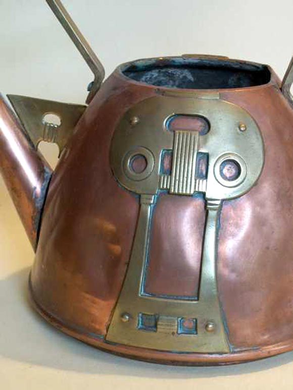 Rare and unique handmade copper and bronze water can from the Arts & Crafts period in Central Europe.

References: Wiener Werkstatte, Viennese Workshops. Bauhaus.