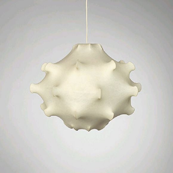 The 'Taraxacum' (Dandelion in Italian) Cocoon Chandelier/Fixture is a Large Light Sculpture in Organic Form that produces Soft Warm Light. The Piece Established the Castiglioni Brothers as Design Innovators.