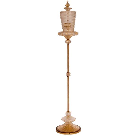 An Exquisite and Important Italian Murano Glass Floor Lamp by Barovier e Toso circa 1930. Venetian glass blowers referenced their proud heritage with the creation of this early Italian Mid-century masterwork of glass blowing. Handblown clear Murano