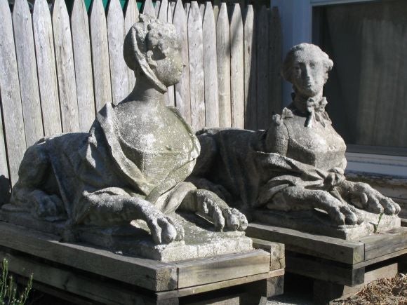 2 Elegant Garden Sculptures in the Form of Sphinxes and in the Style of the 18th Century. These Statues featuring the Images of Marie Antionette and Madame Pompadour are Dramatic and Imposing; yet Maintain a Subtle Sense of Intrigue, Delicacy and
