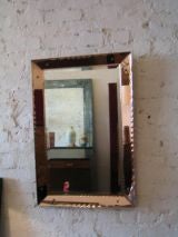 Mirror Framed  by a Rose Colored Mirror