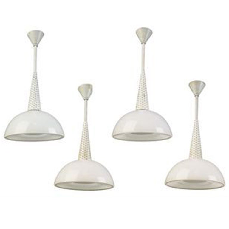 1 French Mid-Century Modern white enameled metal pendant / lantern fixture / chandelier with a luminescent bowl of holophane glass. Subtle, yet functional lighting when lit. Height is modifiable from 12