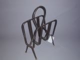 jacques adnet magazine rack