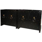 Pair of  Tommi Parzinger Studded Black Lacquered Cabinets