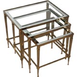 Chic Brass Nesting Tables with Mirrored Reveal Tops.