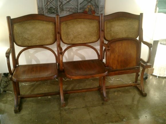 Whimsical European Theater seating with original chenille.