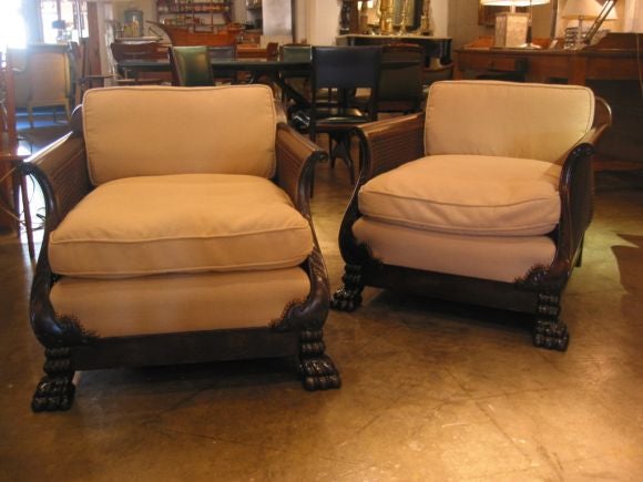 Mahogany and wicker deep sofa and armchairs. Newly reupholstered and restored to mint condition.  Extremely comfy!<br />
**SOLD AS SET OR SEPARATELY**