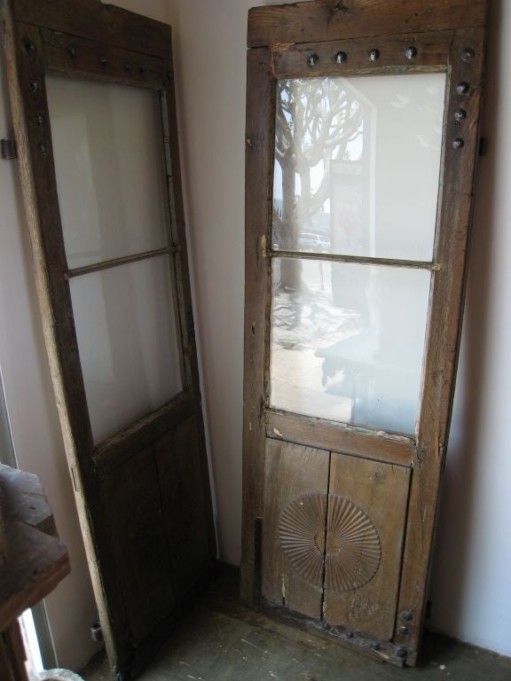 Pair of Two Rustic Carved Italian Doors