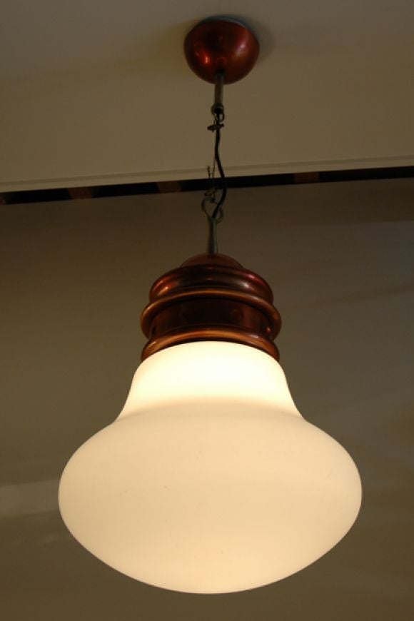 Wire suspension lamp designed in Italy, circa 1970 by Piero Brombin for Artémide. Satin glass and copper. Wired for US junction boxes. Takes one e27 100w maximum bulb