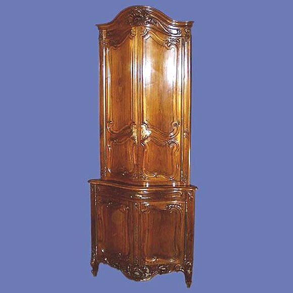 Pair of outstanding French 19th century walnut corner cupboards