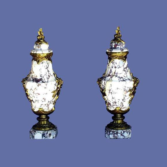 Pair of French veined marble cassoulettes with stylized bronze ornamentation.<br />
FOR MORE INFORMATION, PLEASE VISIT WWW.CONNOISSEURANTIQUES.COM