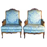 Pair of French 19th century upholstered walnut bergeres.