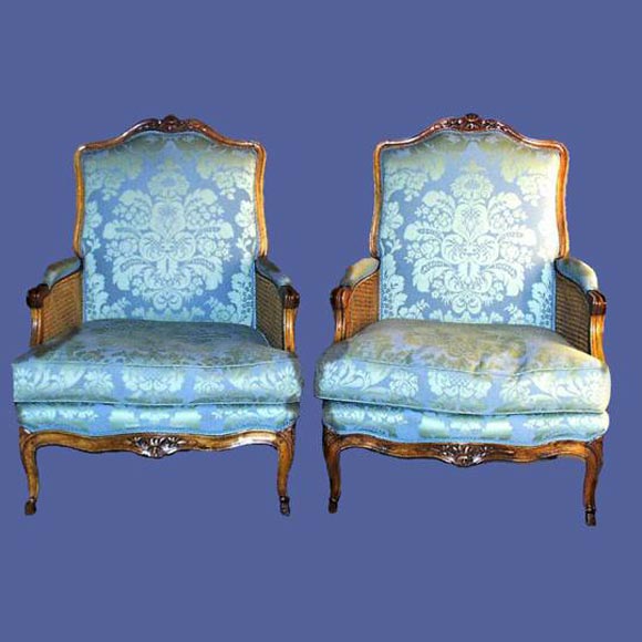 Pair of French 19th century upholstered walnut bergeres.